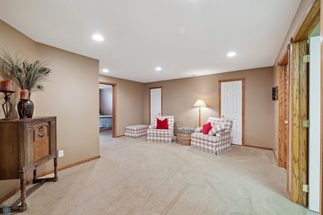 living area with carpet