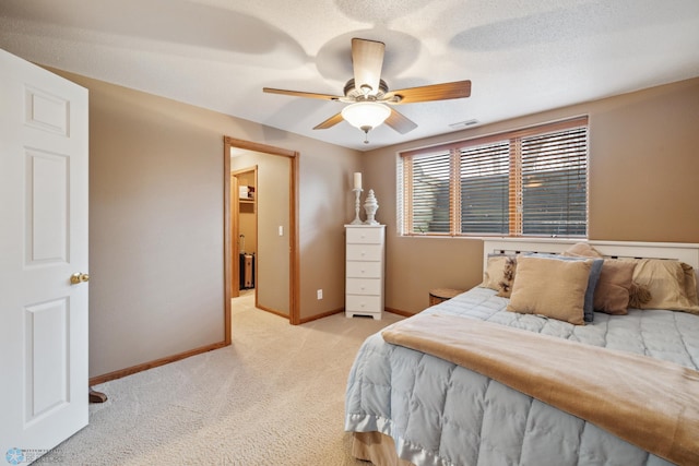 bedroom with light colored carpet and ceiling fan