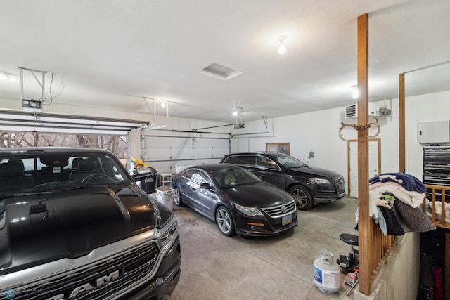 garage featuring a garage door opener