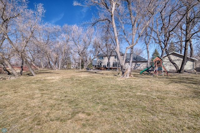 view of yard featuring a playground