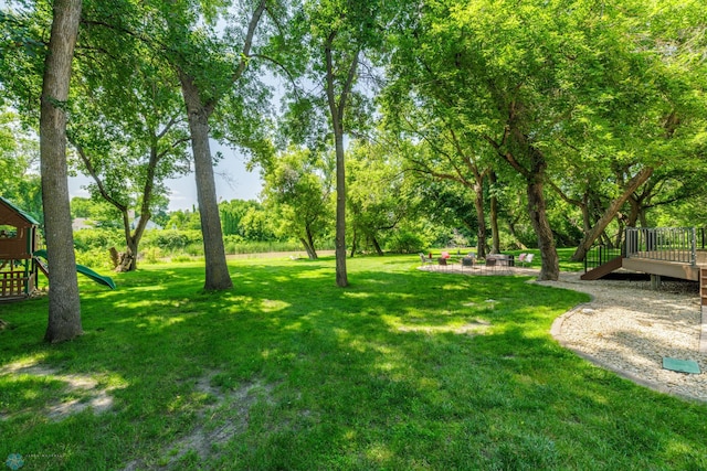 view of yard featuring a playground