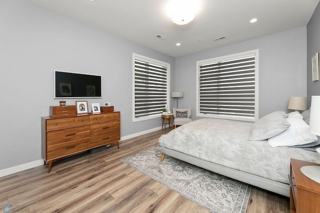 bedroom featuring light hardwood / wood-style floors