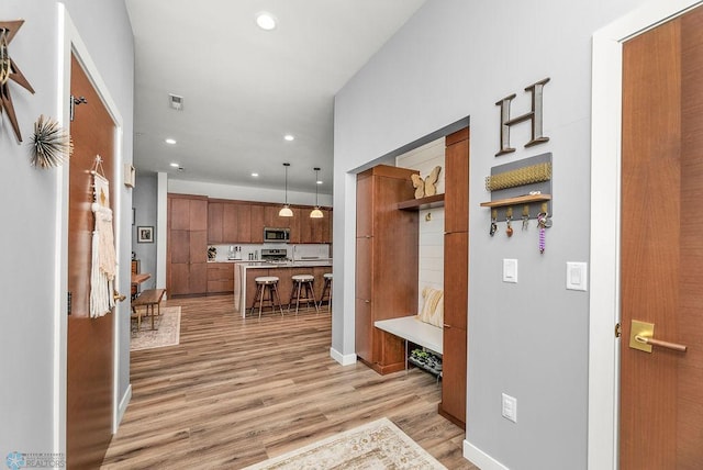 hall featuring light hardwood / wood-style flooring