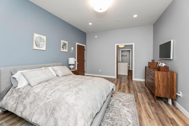 bedroom featuring dark wood-type flooring