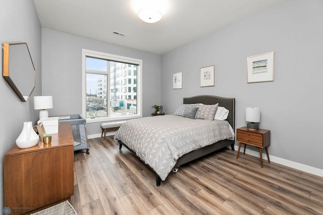 bedroom featuring wood-type flooring