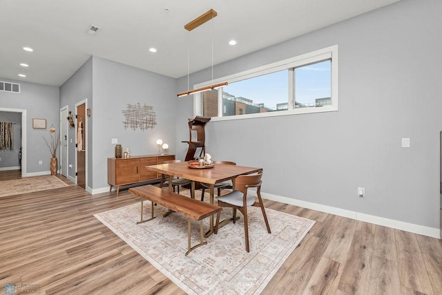 dining room featuring light hardwood / wood-style floors