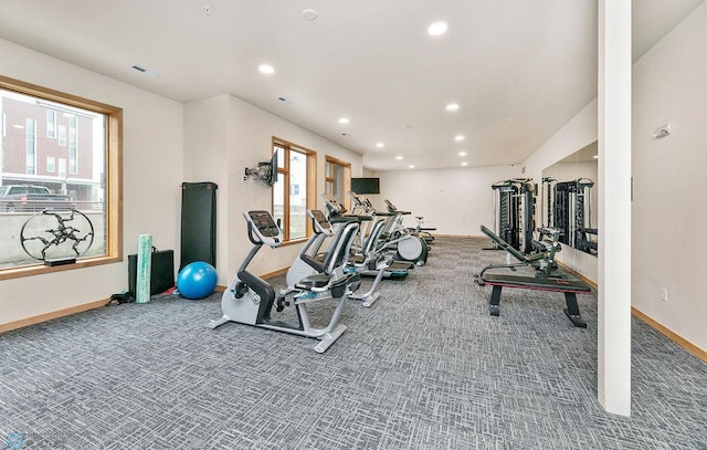 gym with dark colored carpet