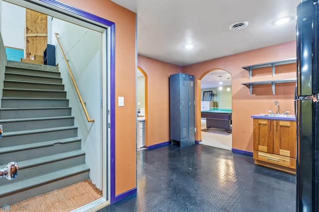 stairs with wet bar