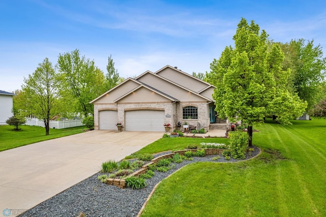 view of front of home featuring a garage and a front yard