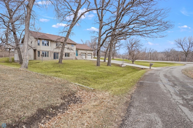 exterior space featuring a front lawn