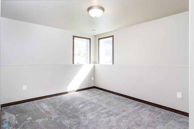 view of carpeted spare room