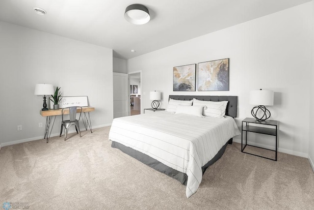 bedroom featuring light colored carpet