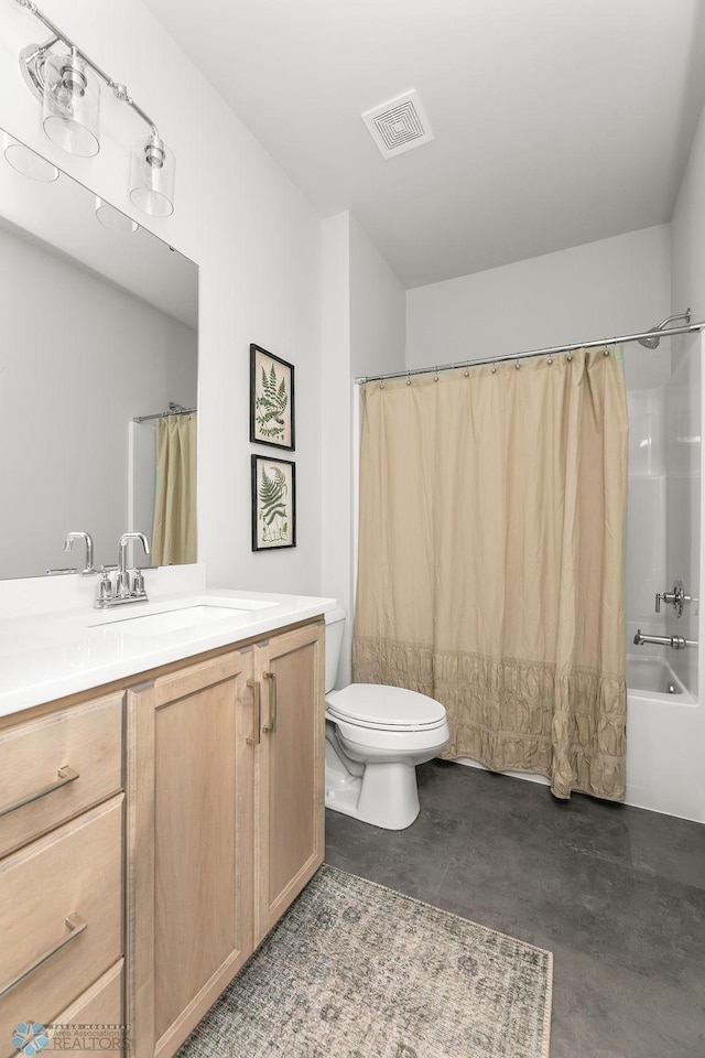 full bathroom with vanity, shower / bath combo, toilet, and concrete flooring