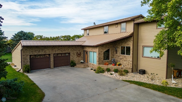 view of front of home with a garage