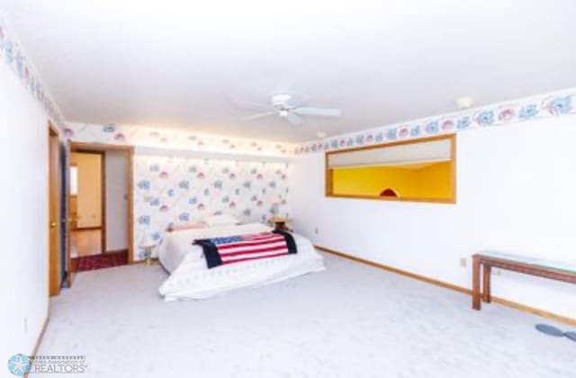 bedroom with carpet and ceiling fan