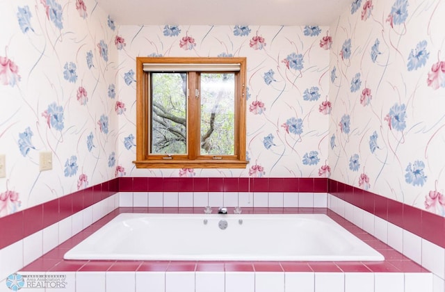 bathroom with tiled bath