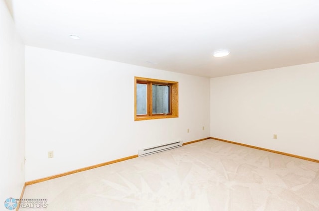 unfurnished room with carpet and a baseboard radiator