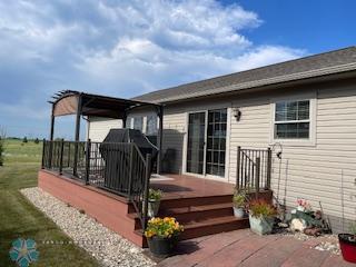 exterior space featuring a wooden deck