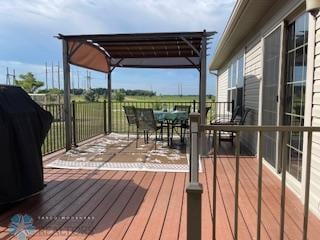 wooden terrace with a pergola