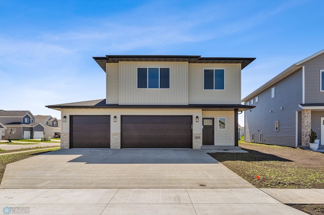 view of front of property with a garage