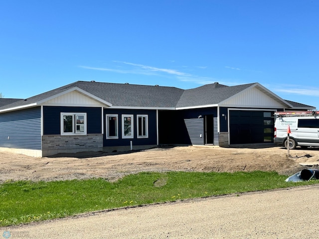 ranch-style house with a garage