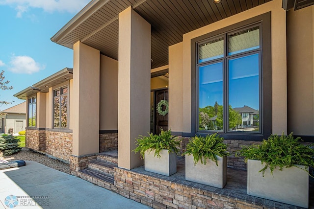 property entrance featuring covered porch