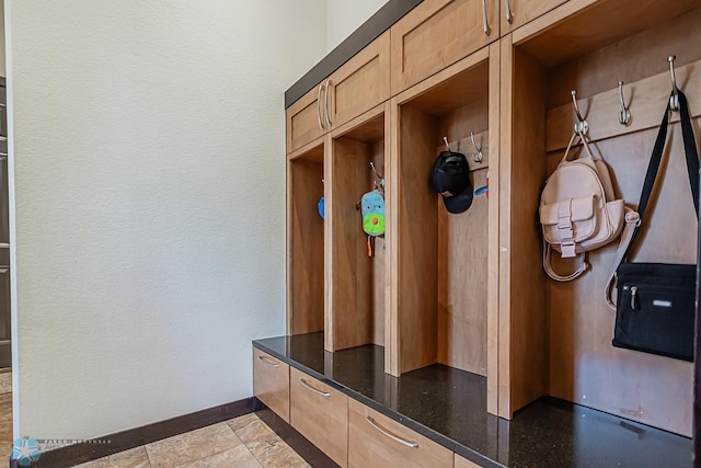 mudroom with light tile flooring