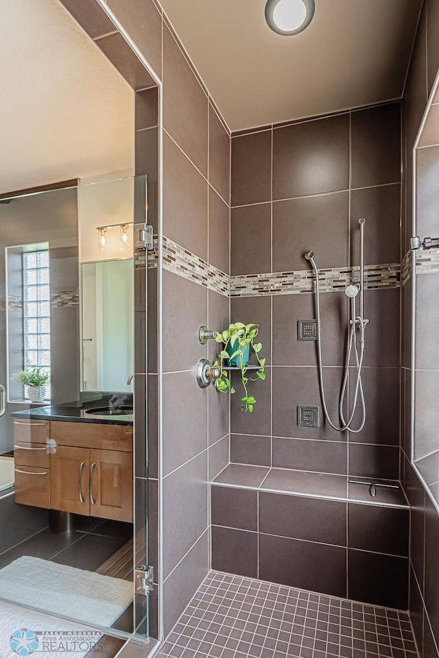 bathroom featuring vanity and tile floors