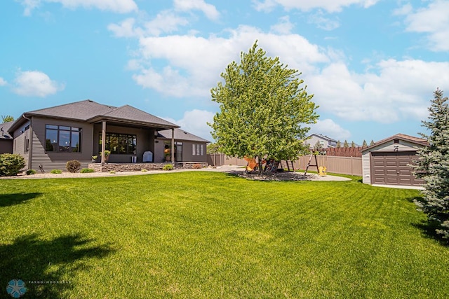 view of yard featuring a garage