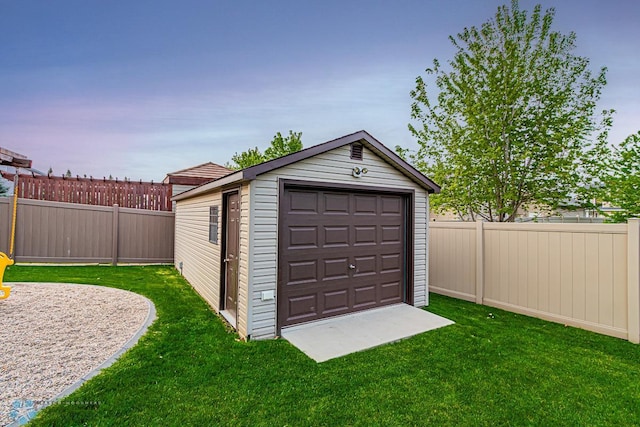 garage with a lawn