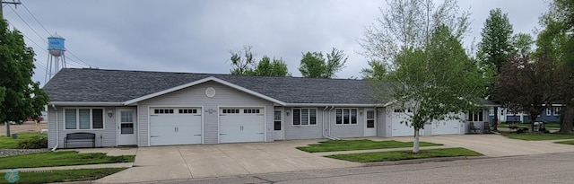 single story home with a garage