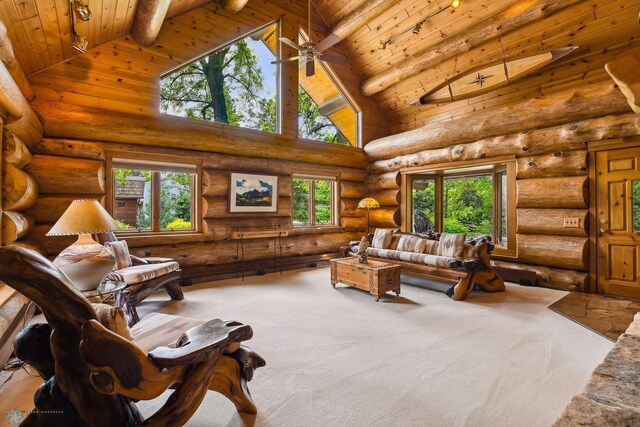 living room featuring high vaulted ceiling, carpet floors, rustic walls, wooden ceiling, and beamed ceiling