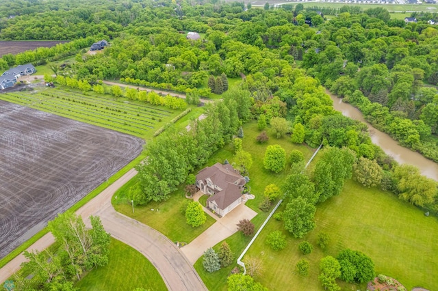 birds eye view of property featuring a rural view