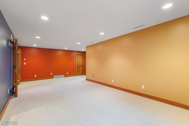 unfurnished room featuring carpet