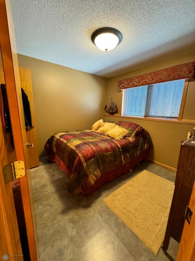 bedroom with a textured ceiling