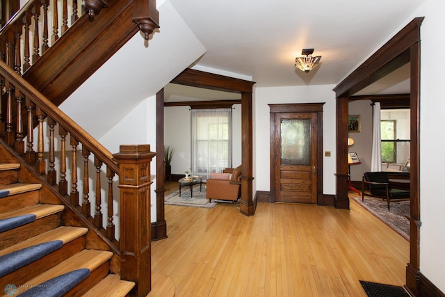 foyer with plenty of natural light and light hardwood / wood-style flooring