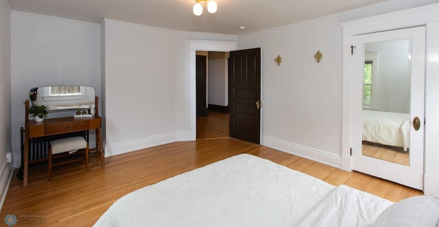 bedroom with light hardwood / wood-style floors