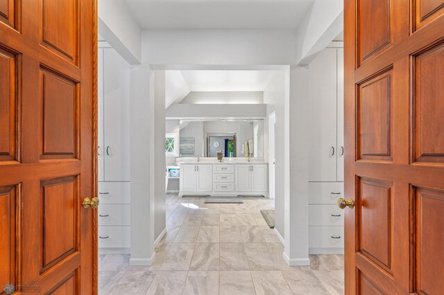 entrance foyer featuring light tile floors