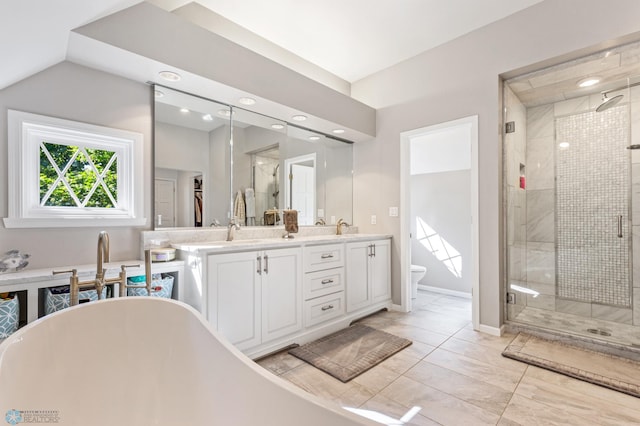 full bathroom with tile floors, oversized vanity, separate shower and tub, toilet, and dual sinks