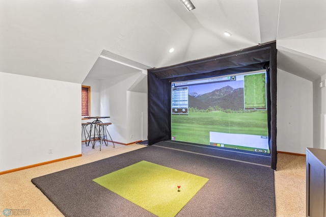 game room featuring vaulted ceiling, golf simulator, and carpet floors