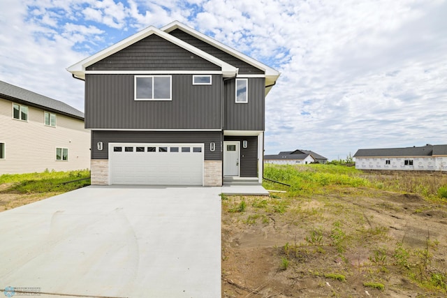 view of front of property featuring a garage