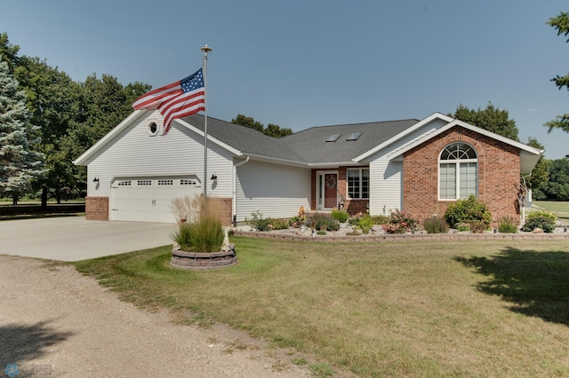 ranch-style home featuring a garage and a front yard