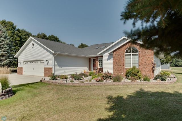 ranch-style house with a garage and a front yard