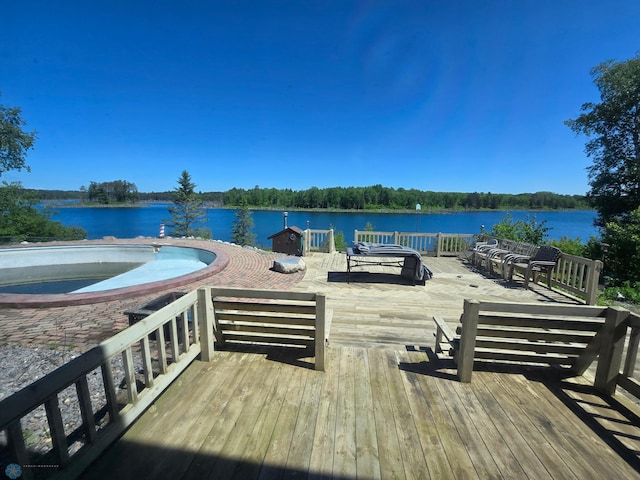 view of dock featuring a wooden deck