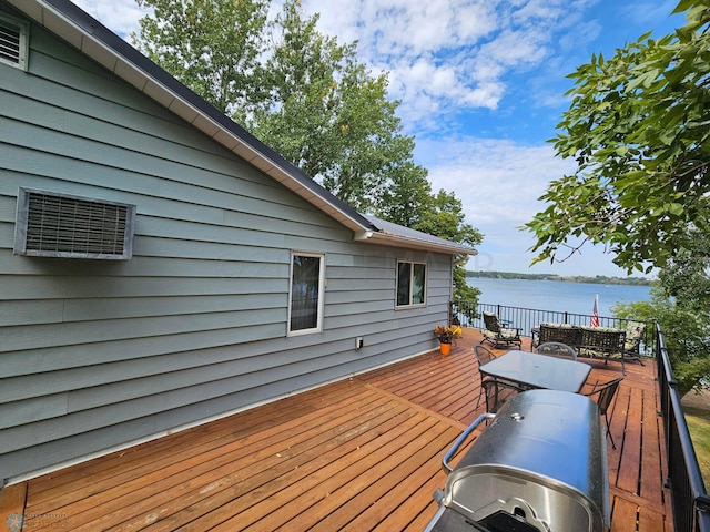 deck featuring a water view