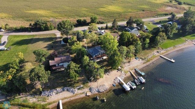 drone / aerial view featuring a water view and a rural view