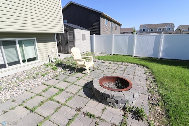 view of patio / terrace with a fire pit