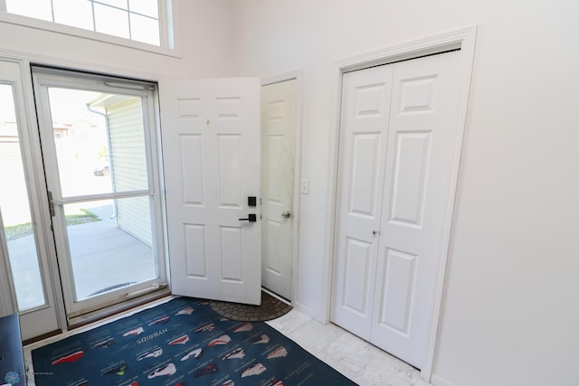 foyer with tile flooring