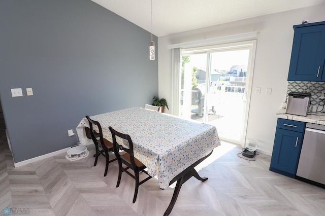 dining area with light parquet flooring