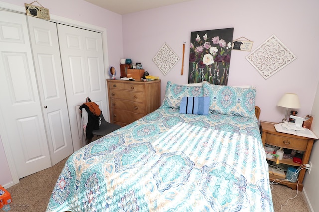 carpeted bedroom with a closet